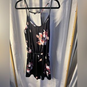 Floral short on piece romper with pockets